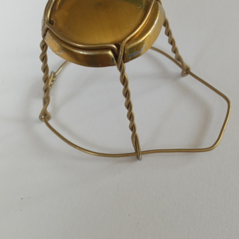 Мюзле з ковпачком (плакеткою) для фіксації коркової пробки